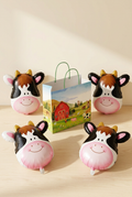 Farm-themed birthday bag displayed open with inflated cow balloons; bundle includes 5 cow balloons and 1 bag