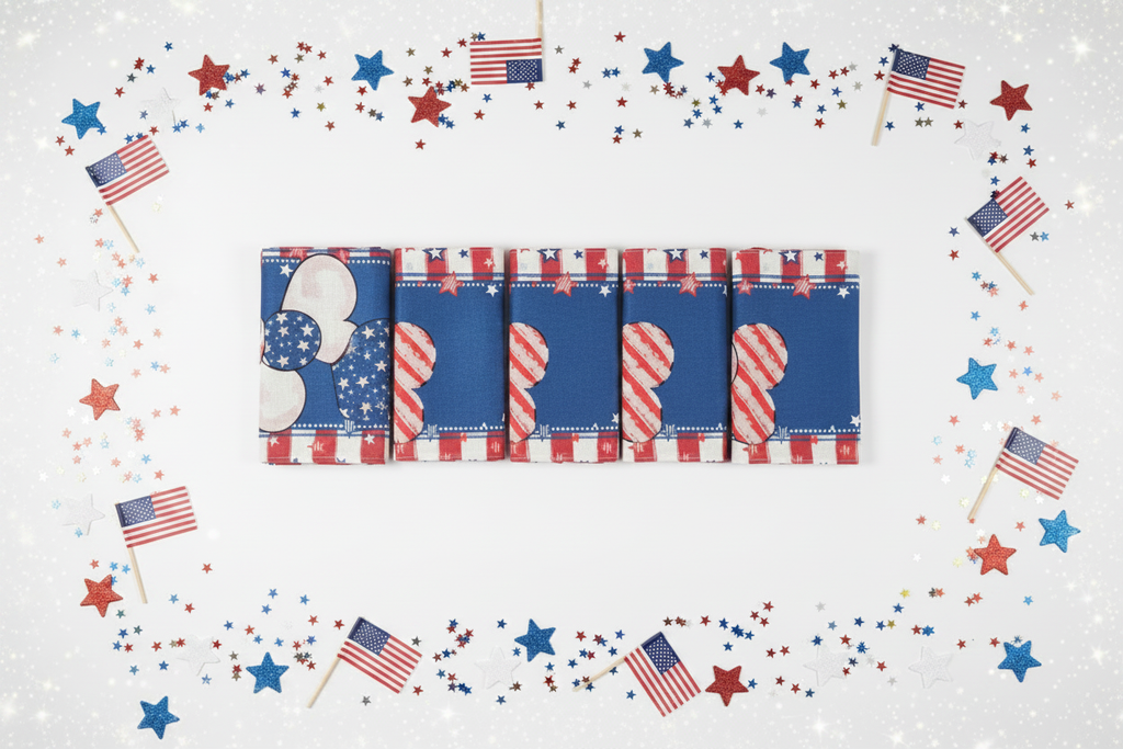 Patriotic red white and blue table runner styled flat lay background with stars and confetti