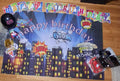 Superhero happy birthday party decor bundle with city skyline backdrop, banner, balloons and accessories